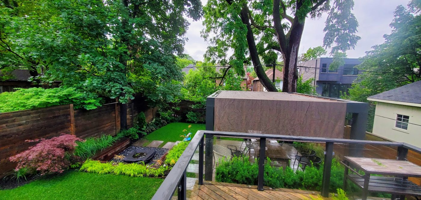 View from the deck showcasing the rest of the backyard