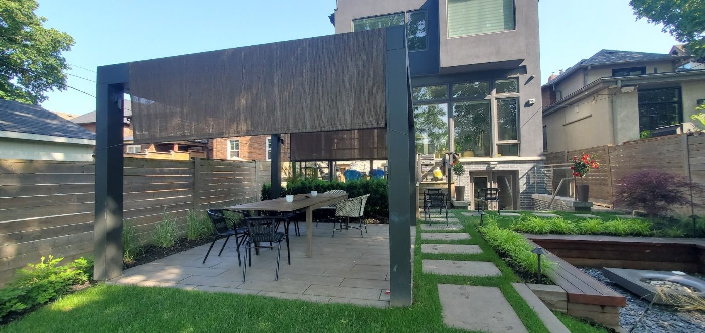 Stone Patio Covered by retractable roof 