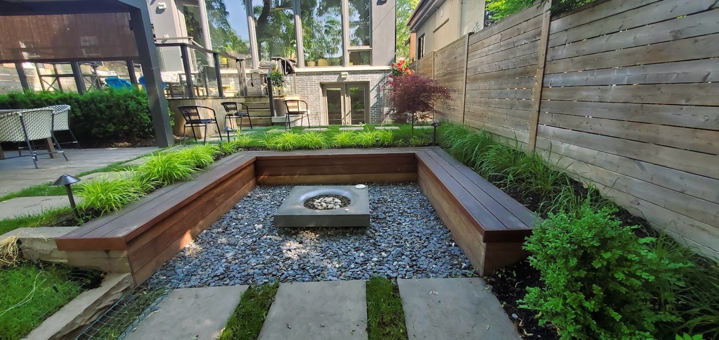 Custom Built Fire Pit with gravel based and surrounding retaining walls