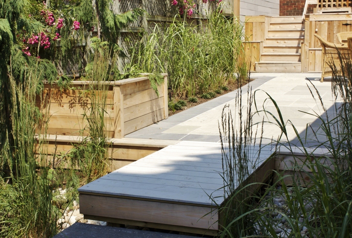 Stormwater run off custom natural design with retaining wall planters