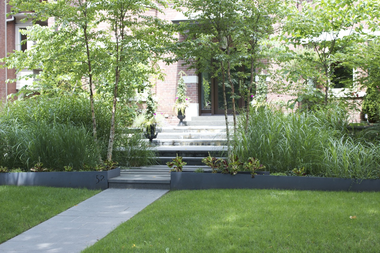 lawn care with well kept garden beds