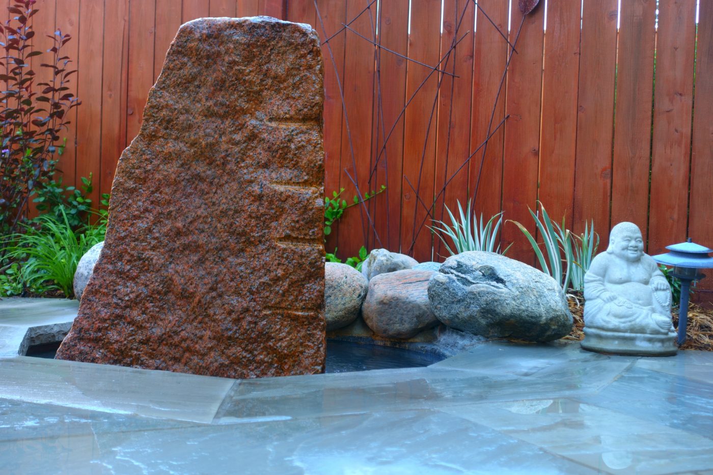 stone patio with Stone sculpture