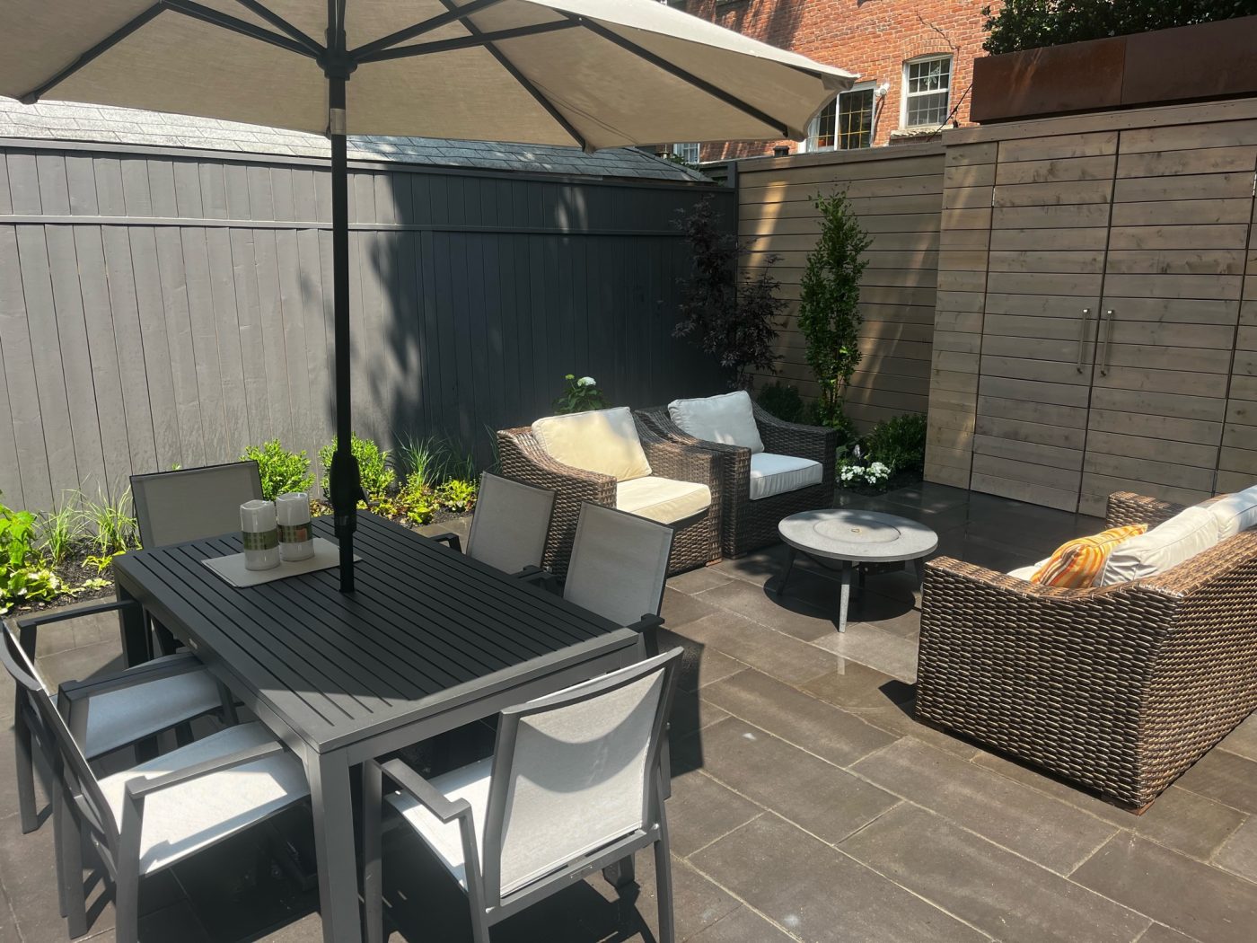 Outdoor Dining area and seating area on stone patio