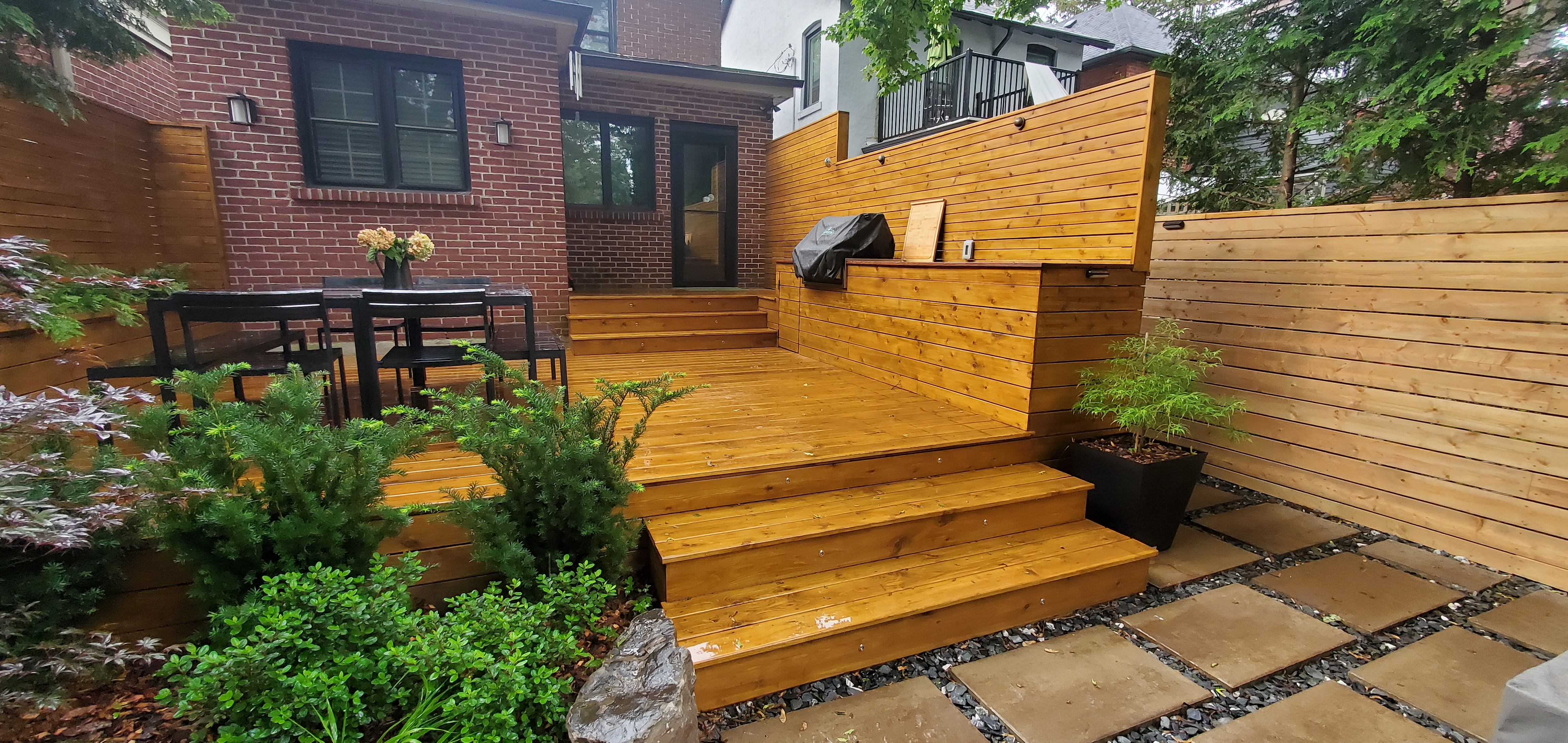 Deck with built in storage and outdoor dining area