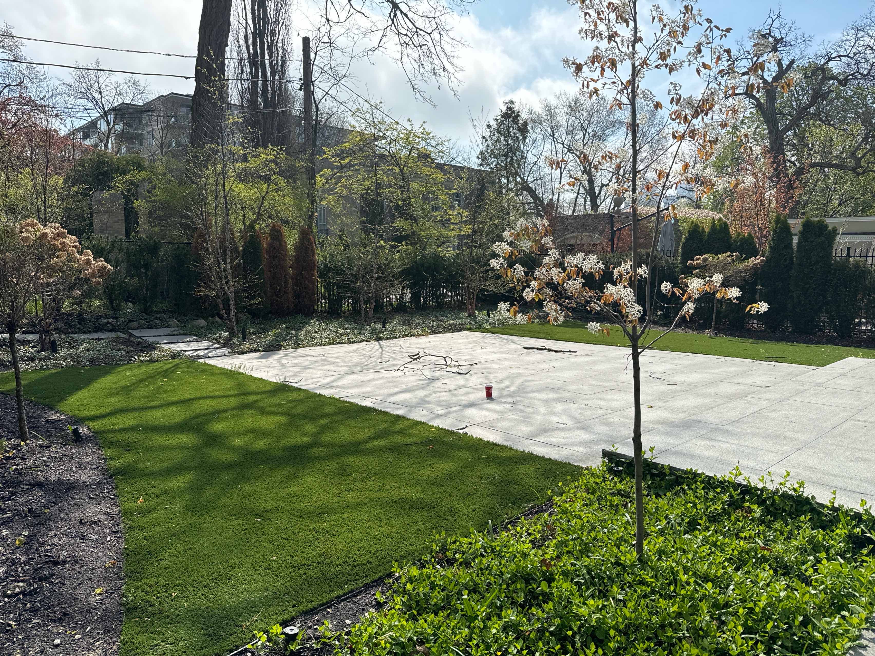 Artificial turn around large concrete pad. Perfect for large outdoor parties