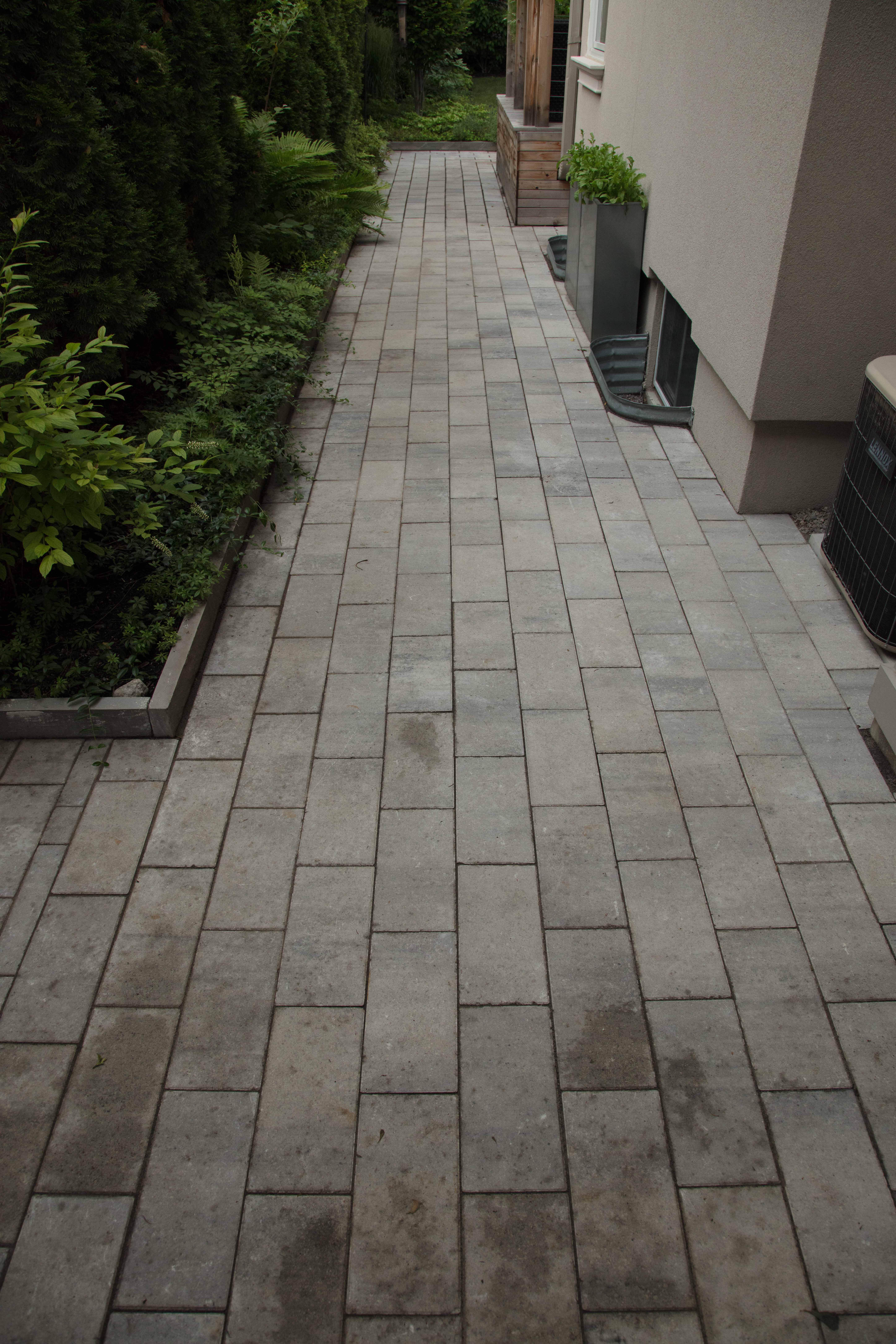 Stone Walkway along side of the house towards backyard