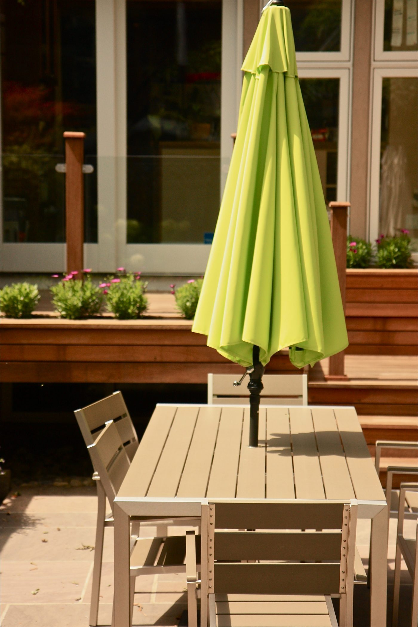 outdoor dining table in front of brand new deck