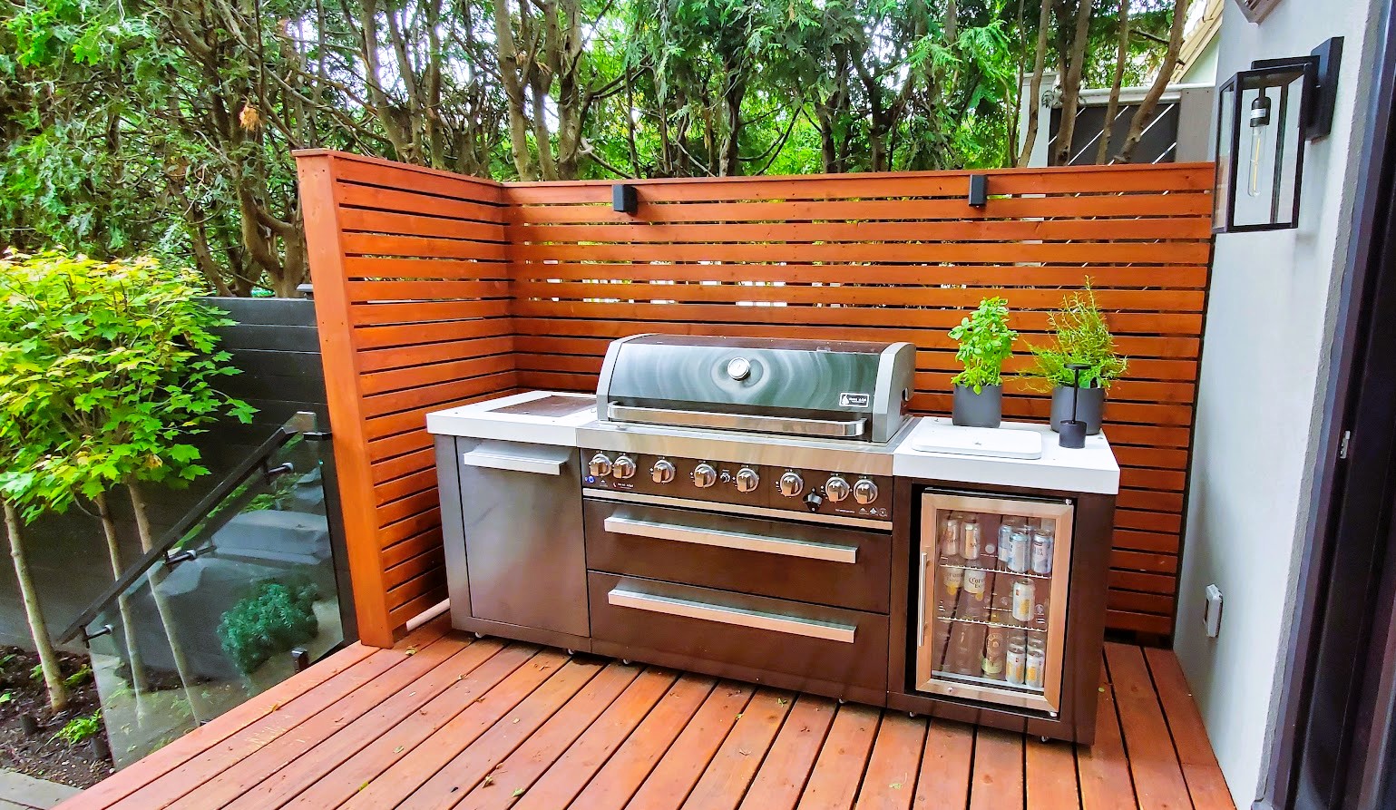 Outdoor Grill in wooden built cubby to provide perfect BBQ spot