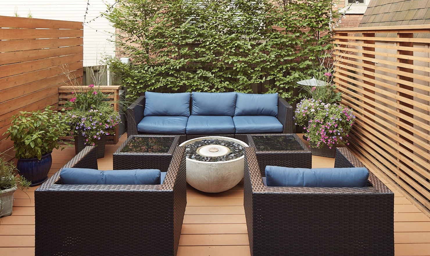 full backyard with outdoor firepit in heart of toronto