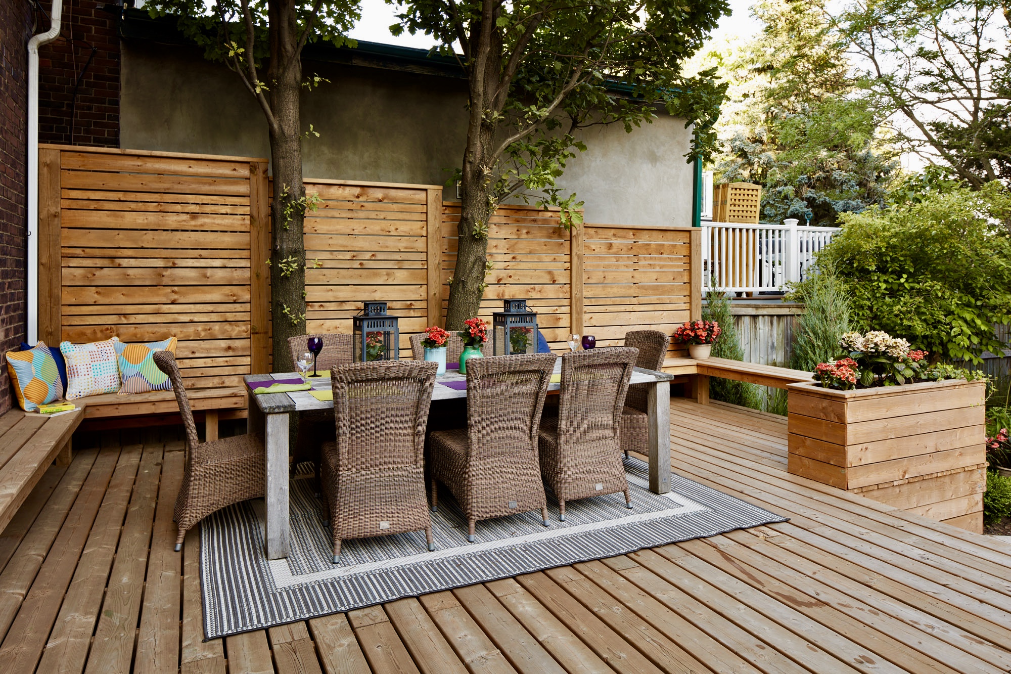 Deck Dining space custom built with stairs leading to the rest of the property