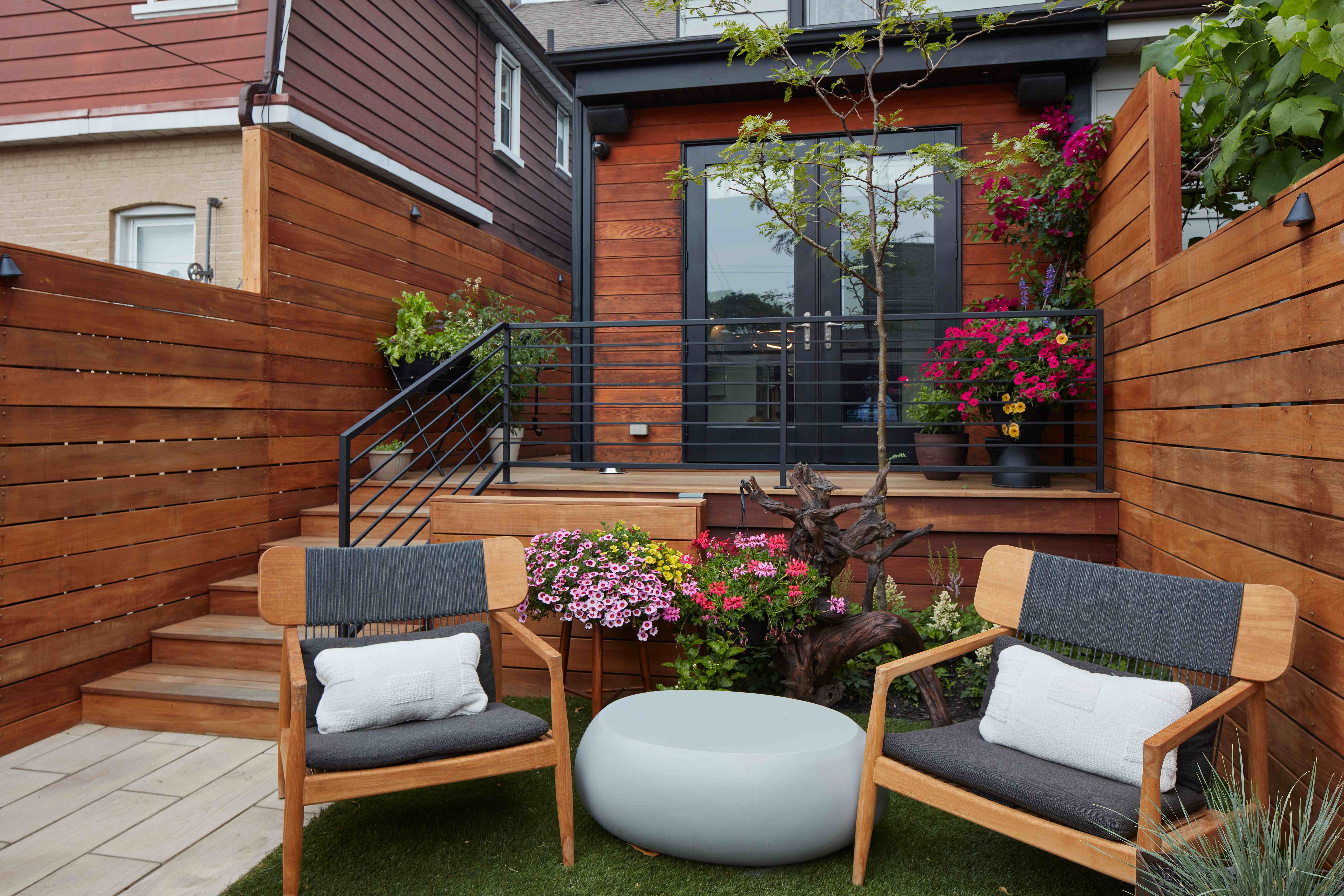 Two chairs in front of deck area