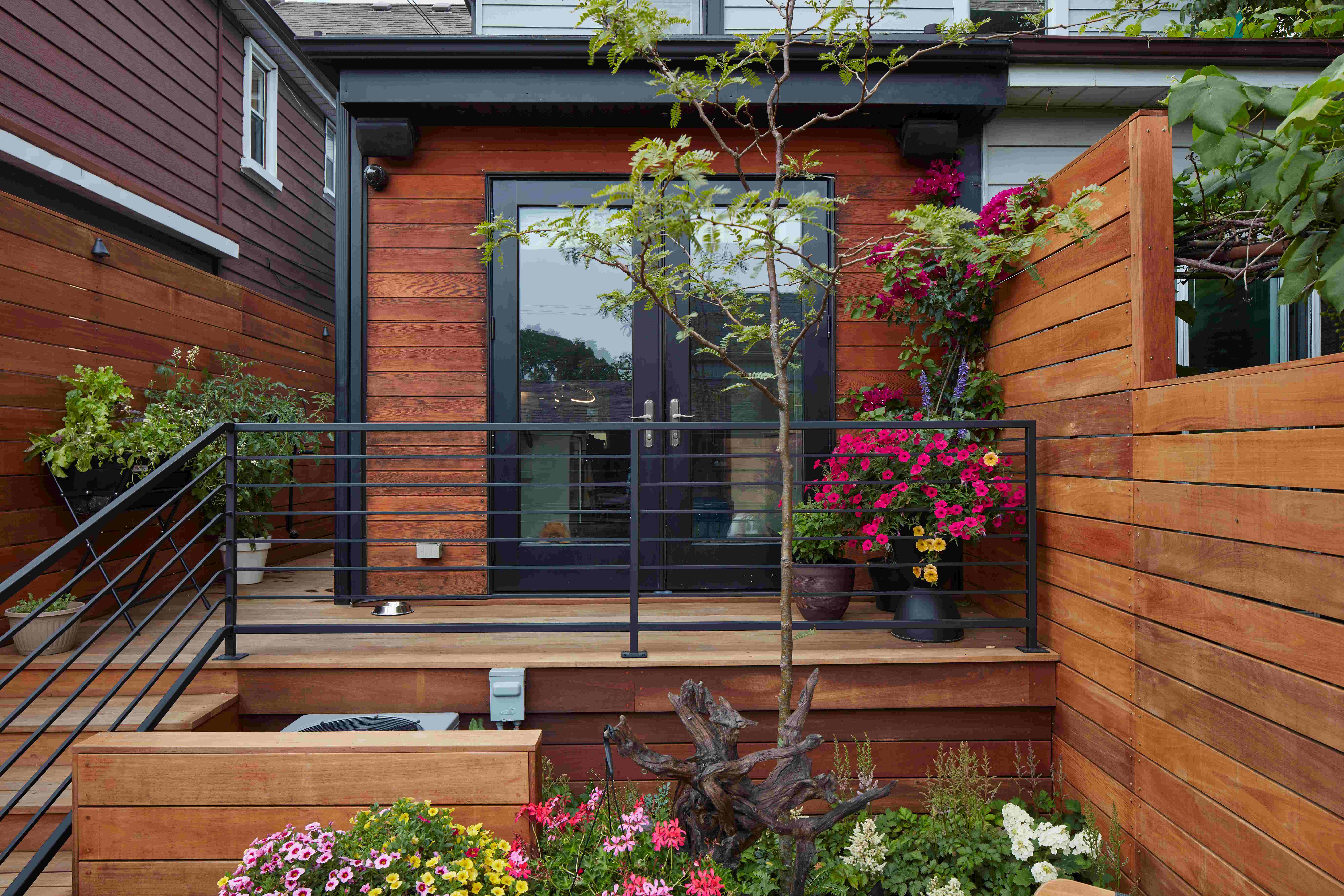 Deck with wood and iron fence