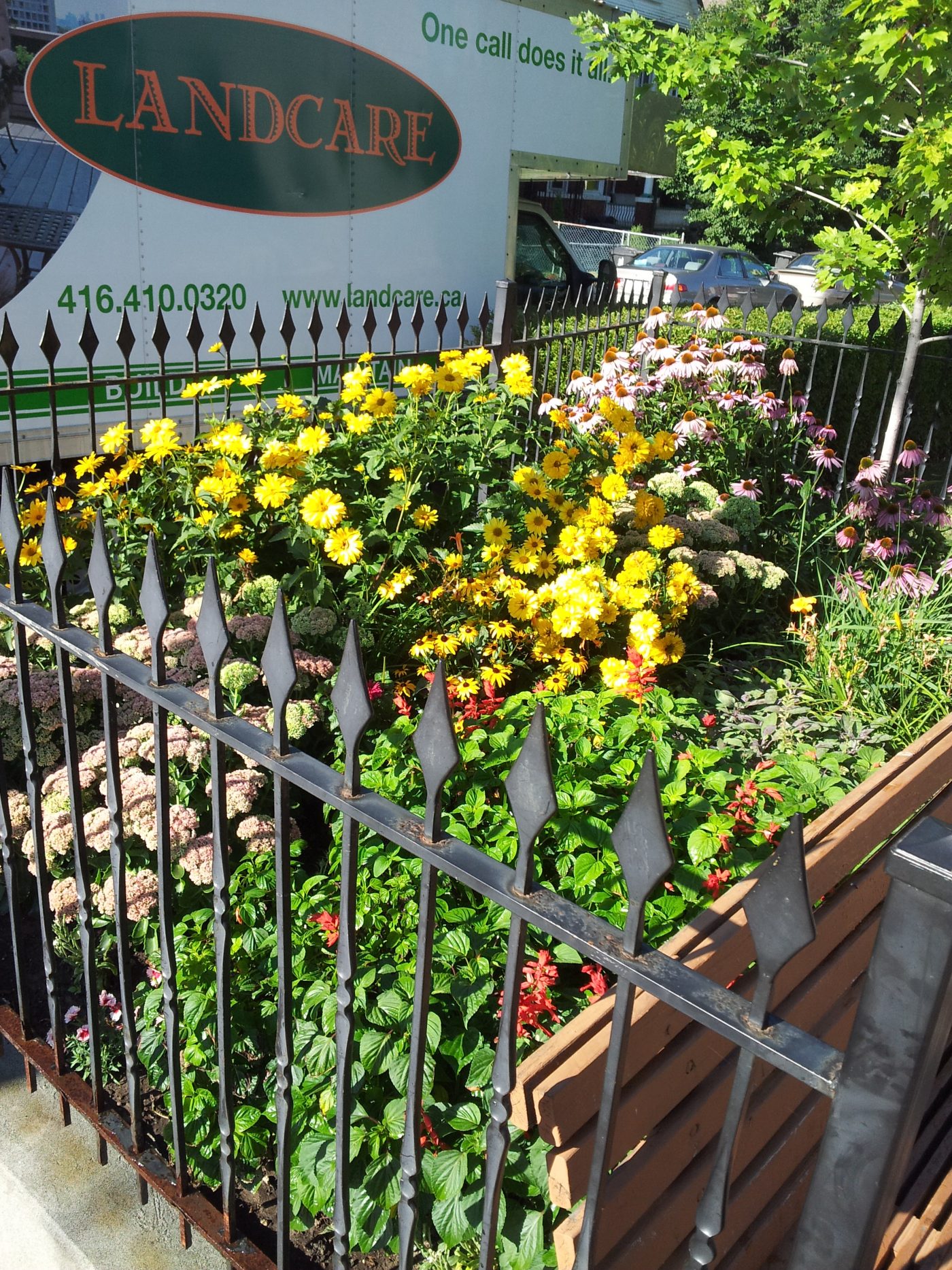 Landcare truck next to the property as service is delivered