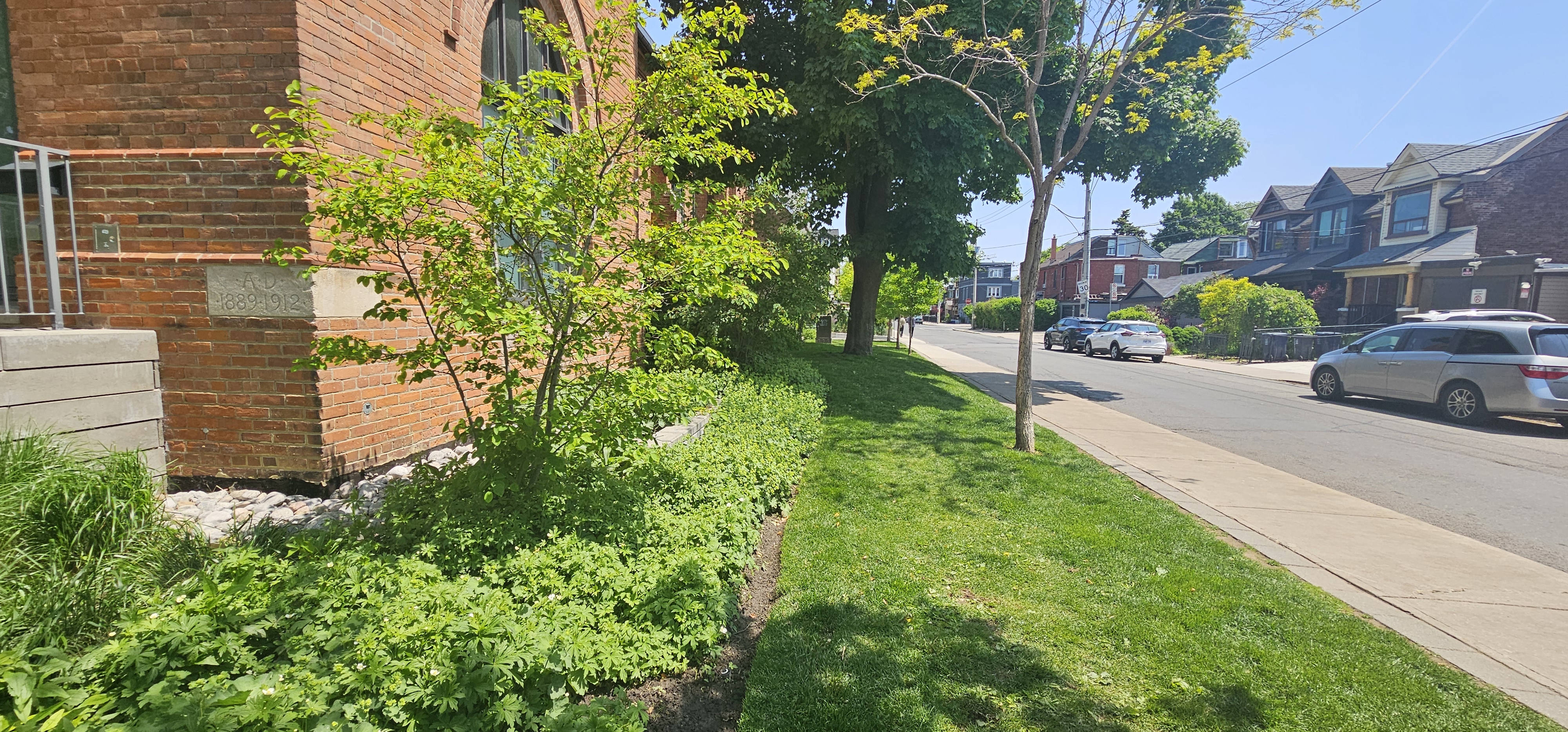 Garden beds outside of town homes main entrance