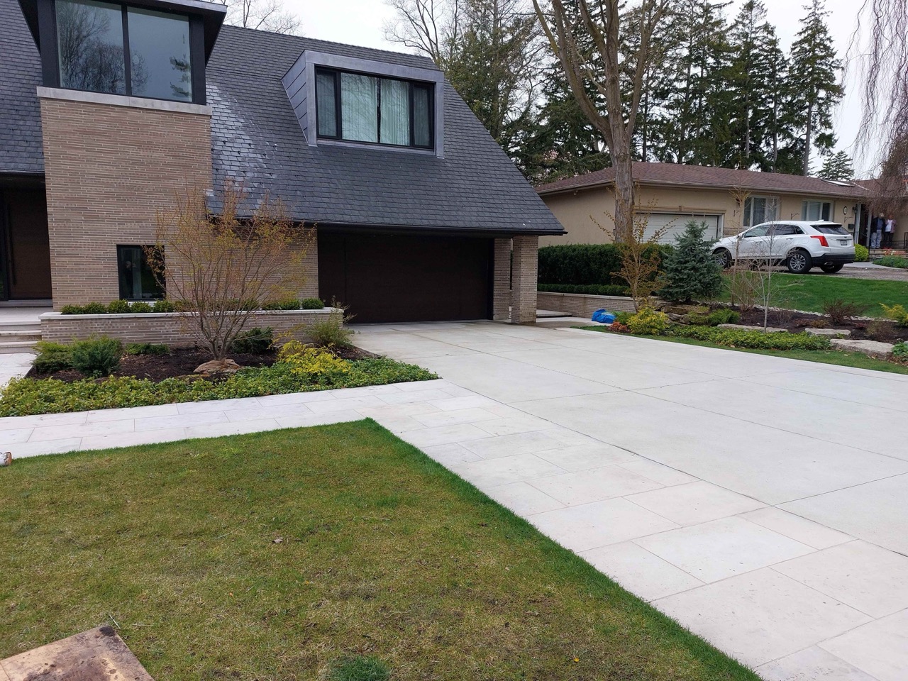 Front Driveway Pad with gardens along the front and sides
